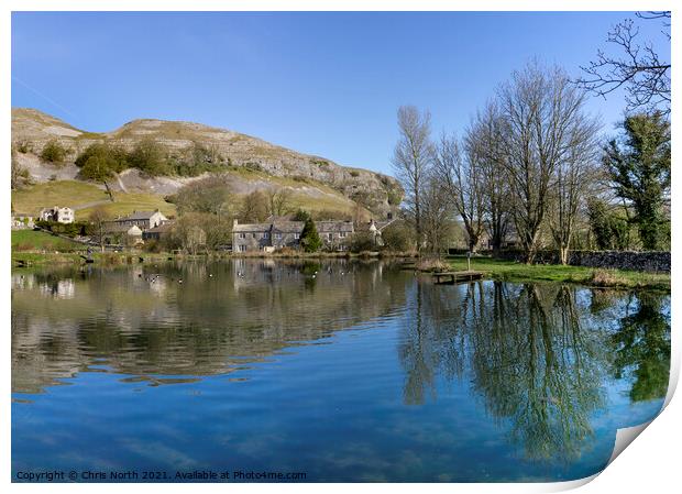 Kilnsey Trout Farm Lake with Kilnsey Crag in the background. Print by Chris North