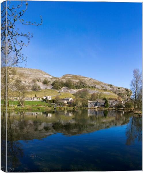 Kilnsey Trout Farm Lake with Kilnsey Crag in the background. Canvas Print by Chris North