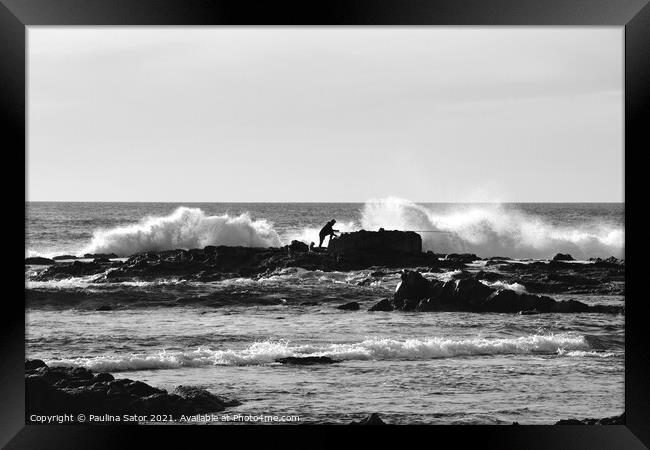Silhouette of a fisherman  Framed Print by Paulina Sator