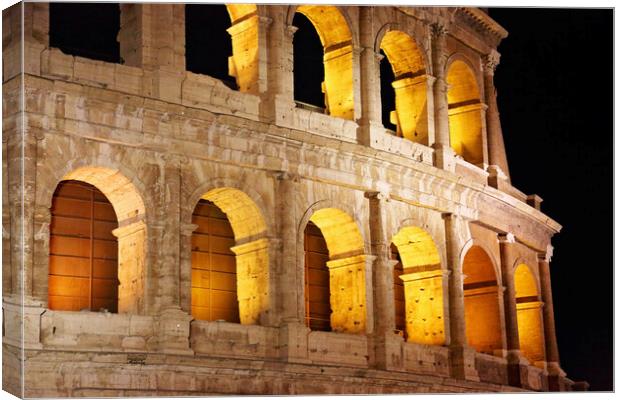 Famous coliseum of Rome at night Canvas Print by Elijah Lovkoff