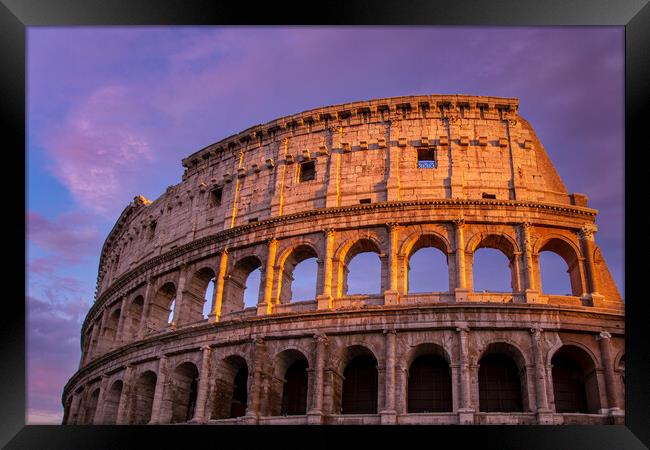 Famous Coliseum Colosseum of Rome at early sunset Framed Print by Elijah Lovkoff