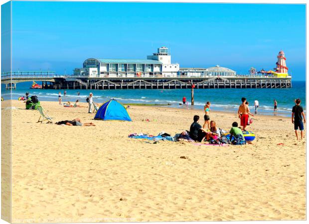 Bournemouth beach and pier in Dorset, UK. Canvas Print by john hill