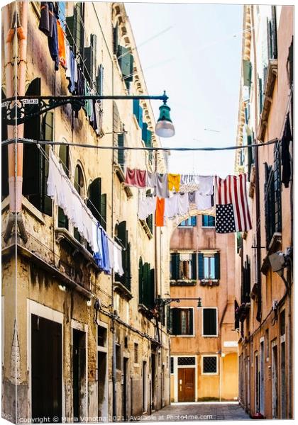 Narrow street in Venice Canvas Print by Maria Vonotna