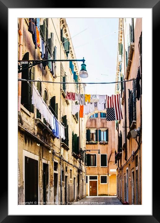 Narrow street in Venice Framed Mounted Print by Maria Vonotna