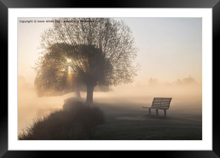 Bench beside misty lake Framed Mounted Print by Kevin White
