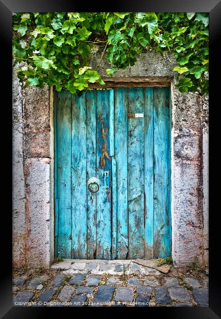 Old blue door in a village in Turkey Framed Print by Delphimages Art