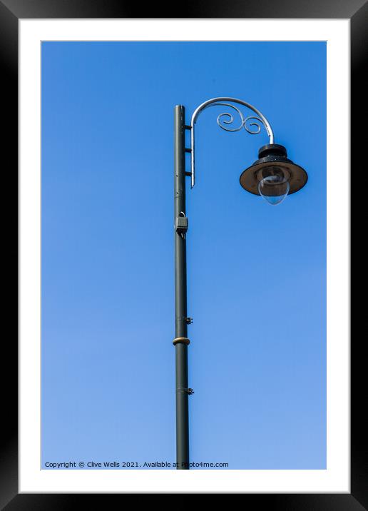 Single street lamp Framed Mounted Print by Clive Wells