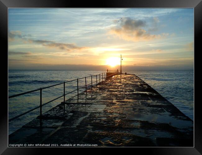 Porthleven Pier Sunset Framed Print by John Whitehead