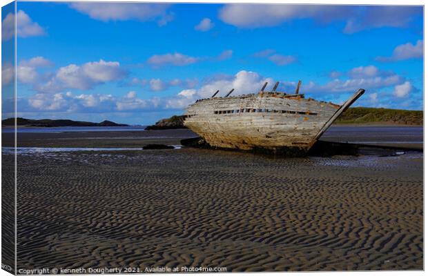 A shipwreck sitting on top of a sandy beach Canvas Print by kenneth Dougherty