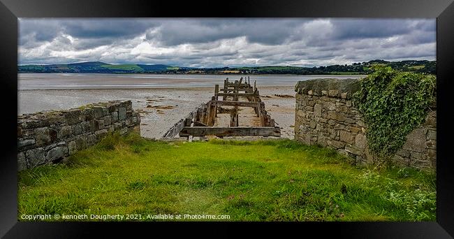 Old wodden pier. Framed Print by kenneth Dougherty