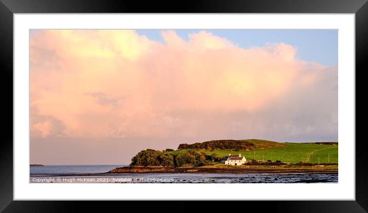 Evening sunlight over Ross bay to Ross cottage Framed Mounted Print by Hugh McKean
