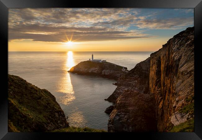 Sunset on South Stack lighthouse Framed Print by Leighton Collins