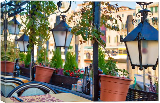 Restaurant terrace near a landmark in Venice Canvas Print by Elijah Lovkoff