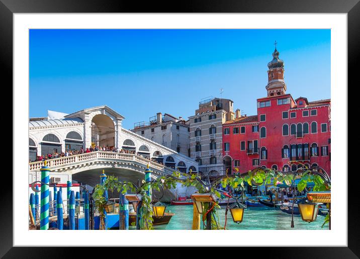 Venice, Italy. Landmark Rialto Bridge, one of the most visited Venice landmark locations Framed Mounted Print by Elijah Lovkoff
