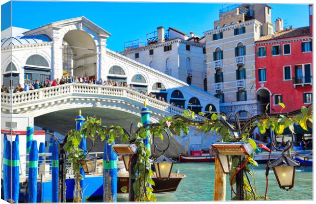 Venice, Italy. Landmark Rialto Bridge, one of the most visited Venice landmark locations Canvas Print by Elijah Lovkoff