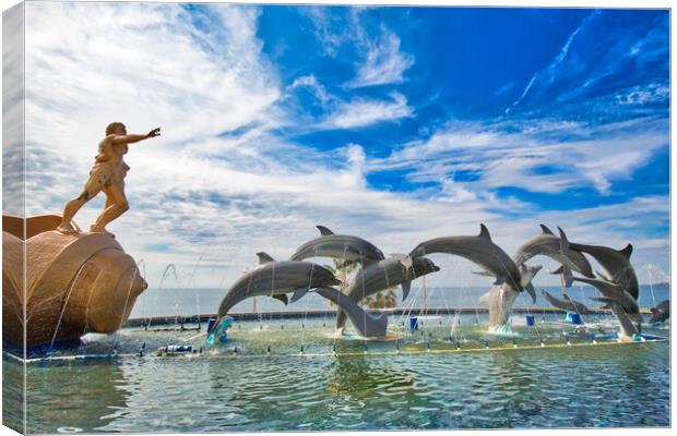 Mazatlan, Mexico, Dolphin Statue located on scenic Mazatlan Promenade (Malecon) near the ocean shore and historic city center Canvas Print by Elijah Lovkoff
