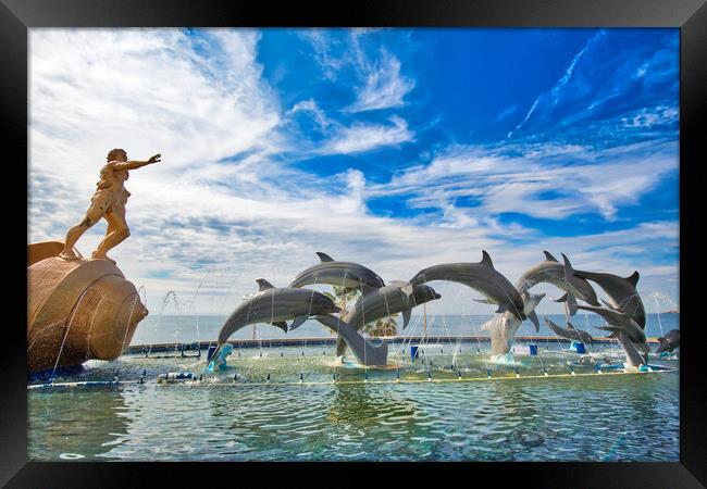 Mazatlan, Mexico, Dolphin Statue located on scenic Mazatlan Promenade (Malecon) near the ocean shore and historic city center Framed Print by Elijah Lovkoff