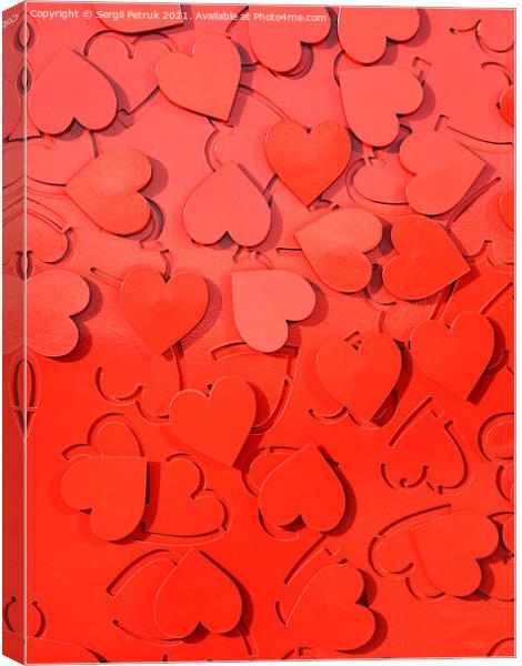 Red metal hearts setting as a symbol of love. Canvas Print by Sergii Petruk
