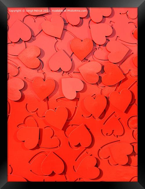 Red metal hearts setting as a symbol of love. Framed Print by Sergii Petruk