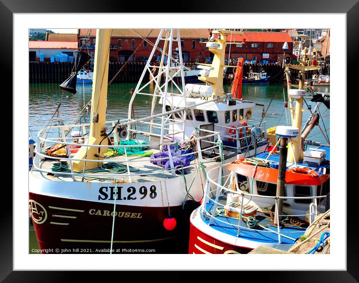 Fishing boats at Scarborough harbour in Yorkshire. Framed Mounted Print by john hill