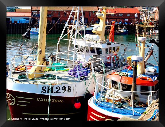 Fishing boats at Scarborough harbour in Yorkshire. Framed Print by john hill