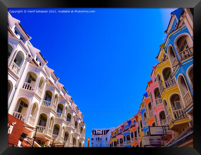 Low angle view of ancient two row of upper floors. Framed Print by Hanif Setiawan
