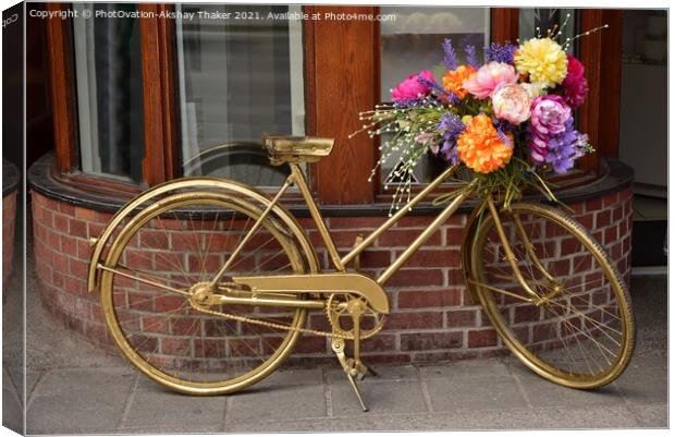 Decorated Golden bicycle with Colorful Flowers Canvas Print by PhotOvation-Akshay Thaker