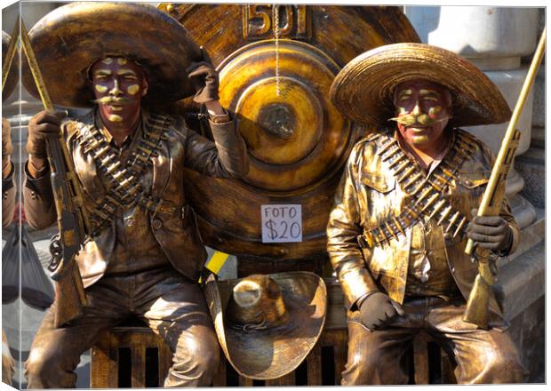 People dressed as bandidos posing at Mexico city streets Canvas Print by Elijah Lovkoff