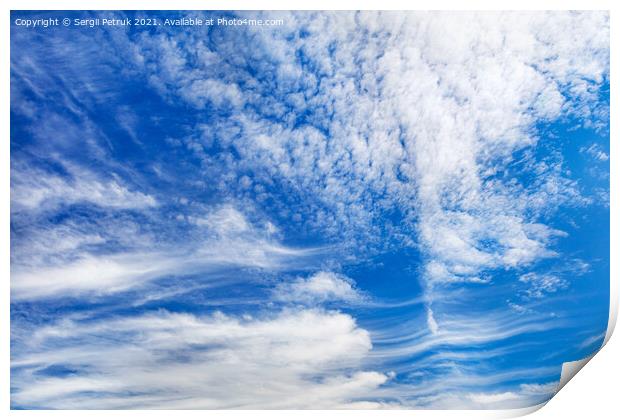 Beautiful blue sky with light white curly clouds. Print by Sergii Petruk