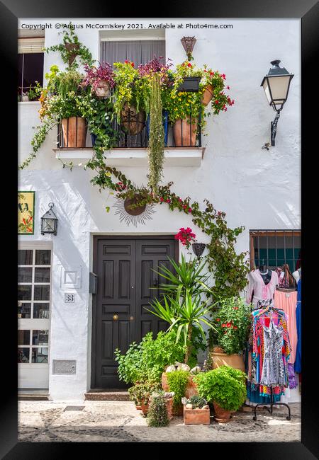Floral display in Frigiliana in Andalusia, Spain Framed Print by Angus McComiskey