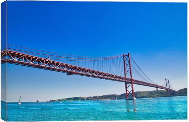 Landmark suspension 25 of April bridge over Tagus River in Lisbon Canvas Print by Elijah Lovkoff