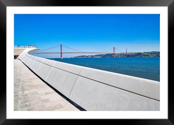 Landmark suspension 25 of April bridge over Tagus River in Lisbon Framed Mounted Print by Elijah Lovkoff