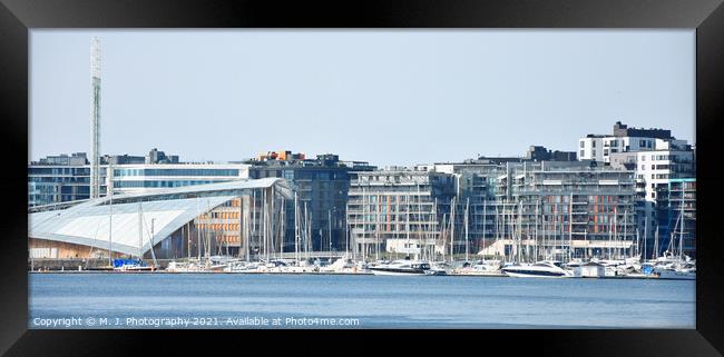 Oslo harbor or harbour at the Aker Brygge neighbou Framed Print by M. J. Photography
