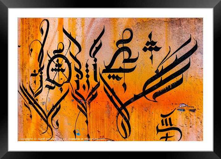 Arabian Calligraphy on wall. Framed Mounted Print by Hanif Setiawan