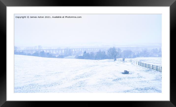 Blizzard conditions in Harringworth Framed Mounted Print by James Aston