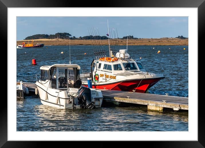 Boats moored in Wells estuary. North Norfolk Framed Mounted Print by Chris Yaxley