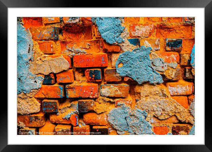 A damaged brick wall in digital brown turquoise bl Framed Mounted Print by Hanif Setiawan
