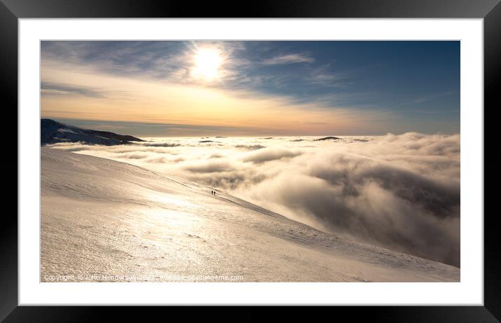 Winter walking Above the clouds Framed Mounted Print by John Henderson