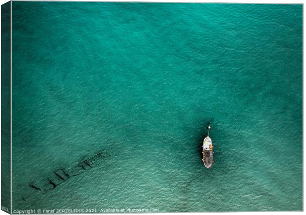 A lonely boat Canvas Print by Fanis Zerzelides