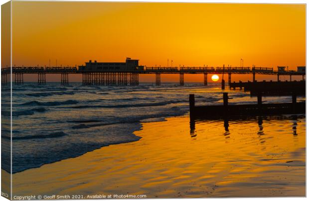 Sun setting at Worthing Pier Canvas Print by Geoff Smith