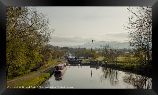 Lazing on a Sunday Afternoon on the canal Framed Print by Richard Perks