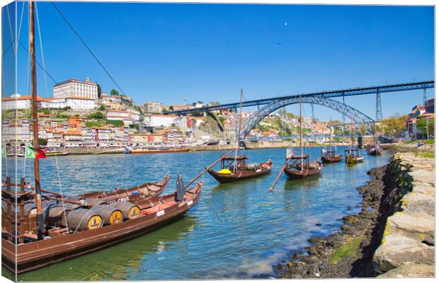 Famousboats providing carrying Porto wine in barrels on Rio Douro Canvas Print by Elijah Lovkoff