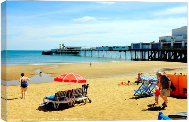 Pier and sands at Sandown on the Ise of Wight, UK. Canvas Print by john hill