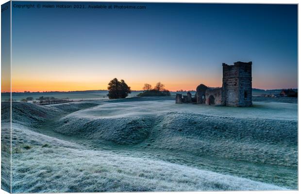 A frosty dawn over the old church at Knowlton Canvas Print by Helen Hotson