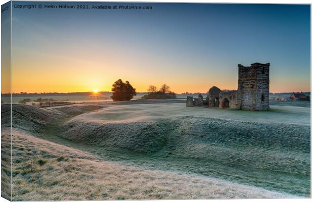 Frosty sunrise over the old church at Knowlton Canvas Print by Helen Hotson