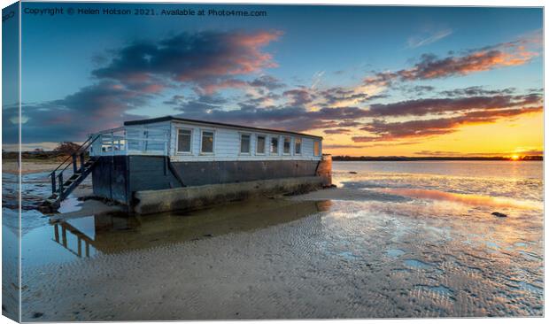 Dramatic sunset over a houseboat in Bramble Bush Bay Canvas Print by Helen Hotson