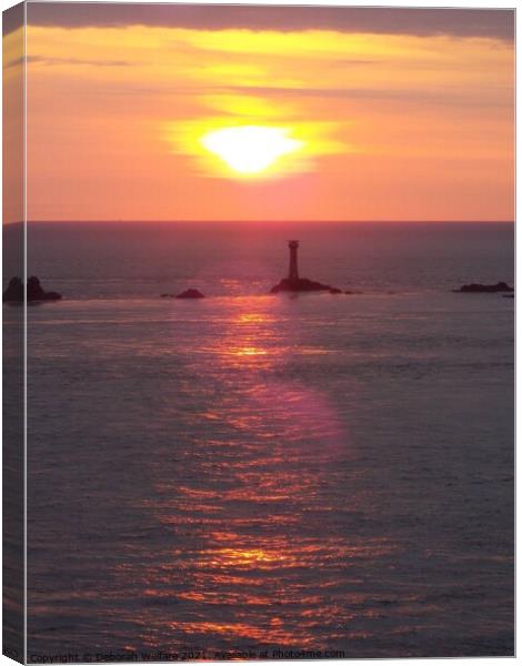 Sunset at the iconic Lands End Cornwal Canvas Print by Deborah Welfare