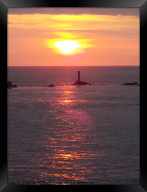 Sunset at the iconic Lands End Cornwal Framed Print by Deborah Welfare