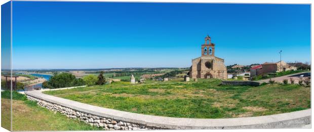 panoramic of a stone church in Castilian village in Spain Canvas Print by David Galindo