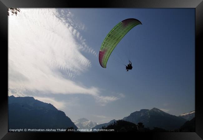 A man flying through the air on top of a mountain Framed Print by PhotOvation-Akshay Thaker